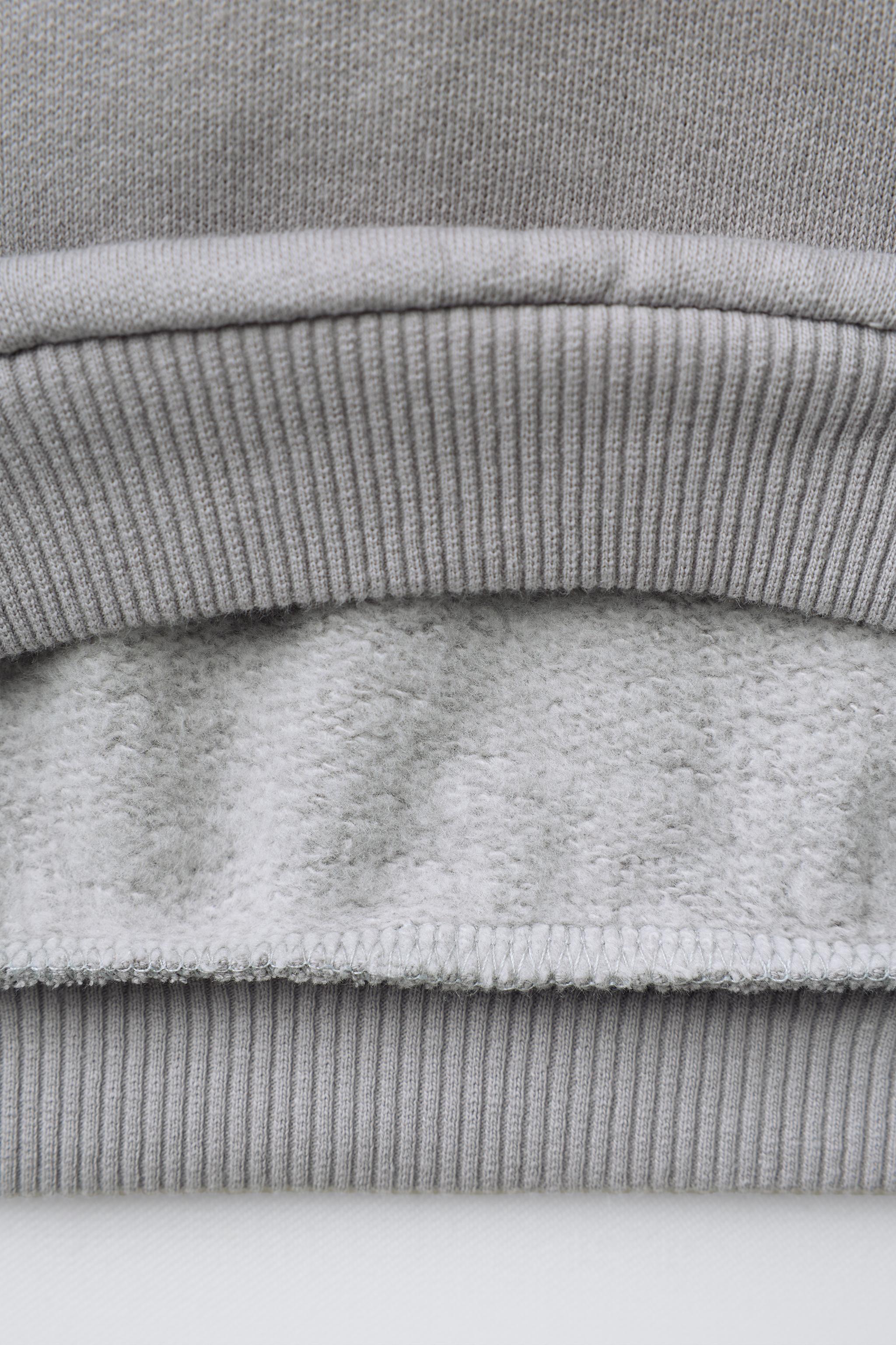 SWEAT CŒUR À INSCRIPTION BRODÉE